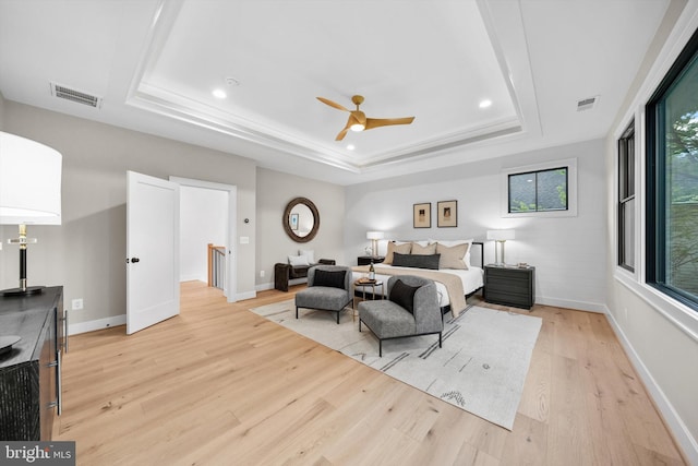 6807 29th St N, Arlington, VA 22213 - bedroom with a tray ceiling, light wood-style floors, recessed lighting, and a ceiling fan
