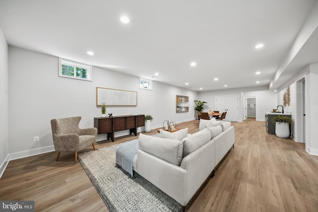 6807 29th St N, Arlington, VA 22213 - living area with light wood-style flooring and recessed lighting