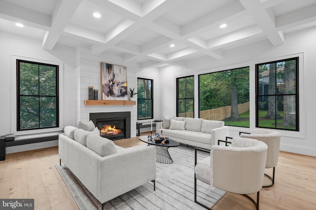 6807 29th St N, Arlington, VA 22213 - living room with a glass covered fireplace, light wood-style flooring, beamed ceiling, coffered ceiling, and recessed lighting
