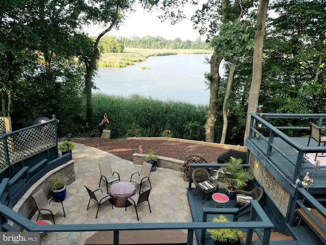 view of patio / terrace with a water view