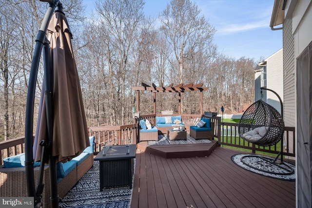 wooden deck featuring an outdoor living space