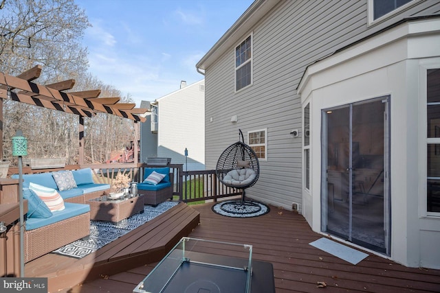 wooden terrace with outdoor lounge area and a pergola