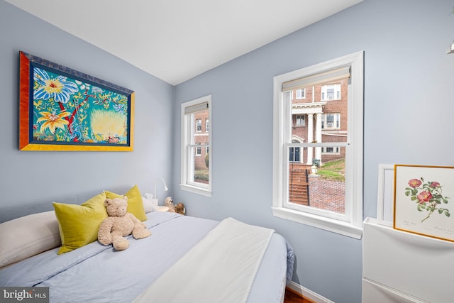 bedroom featuring baseboards