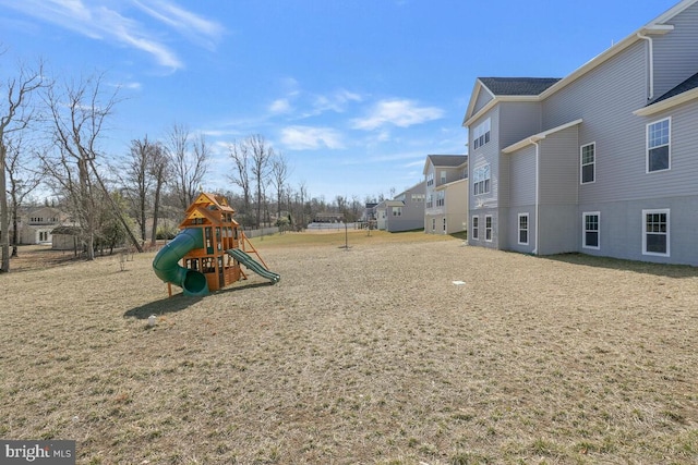 view of playground featuring a residential view