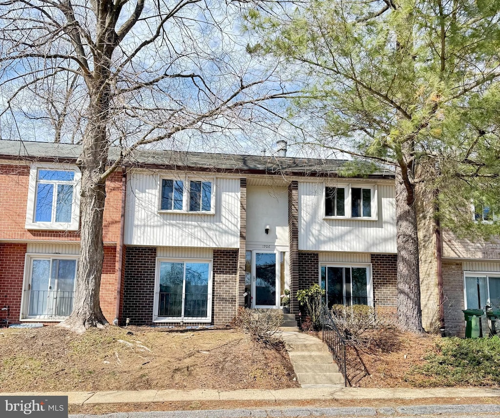 view of front of property with brick siding