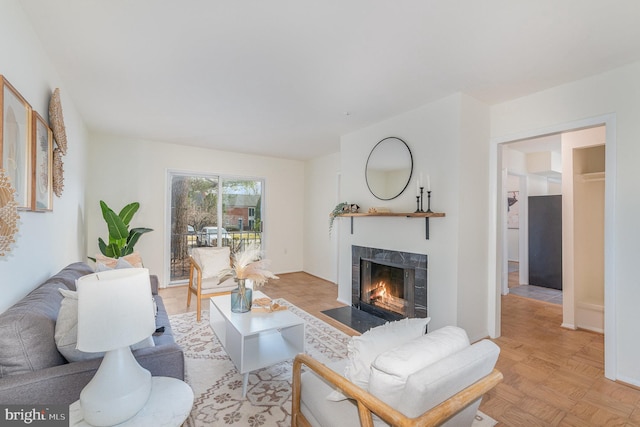 living area featuring a fireplace