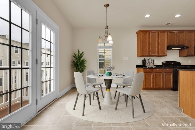 dining room with light tile patterned floors, visible vents, and recessed lighting