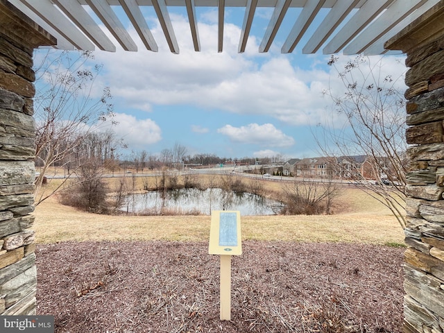 view of yard with a water view