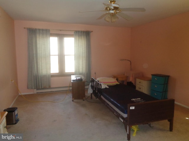 bedroom featuring light carpet, ceiling fan, and a baseboard heating unit