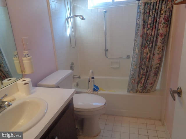 bathroom with toilet, shower / bath combo, vanity, and tile patterned floors