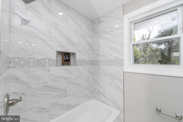 bathroom with shower / bath combination