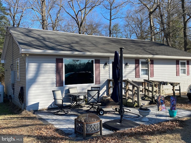 exterior space featuring a fire pit