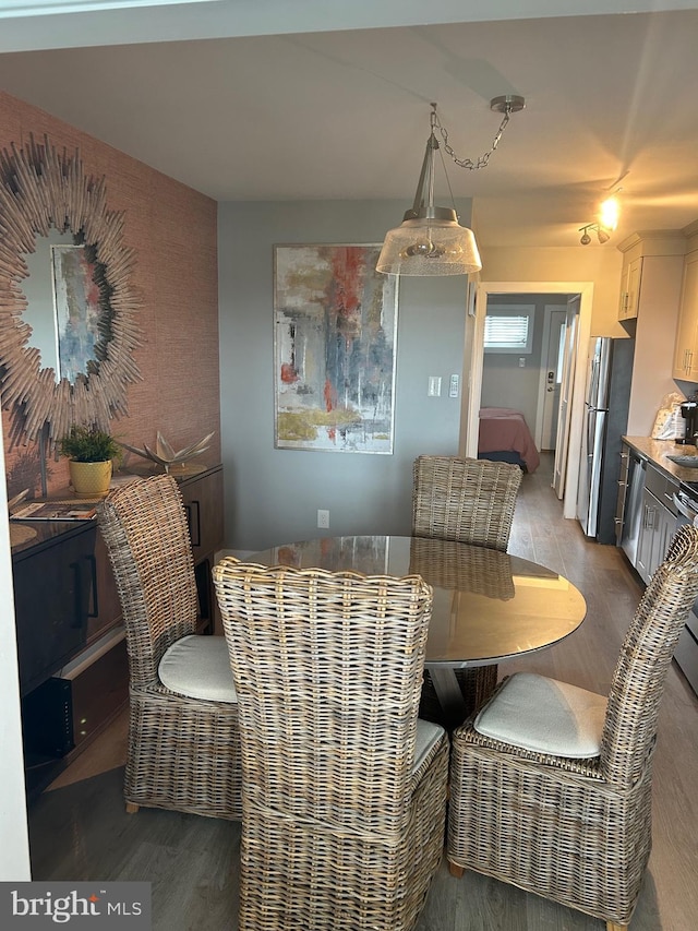 dining area featuring wood finished floors