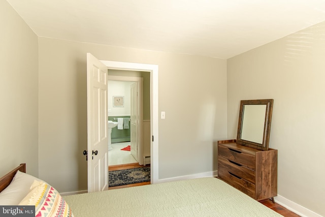 bedroom featuring baseboards