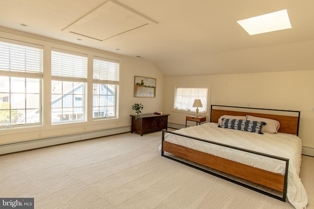 bedroom featuring a baseboard heating unit, vaulted ceiling, and carpet floors