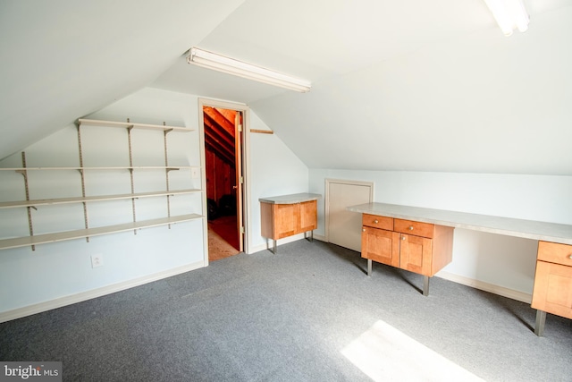 additional living space featuring lofted ceiling, carpet, and baseboards