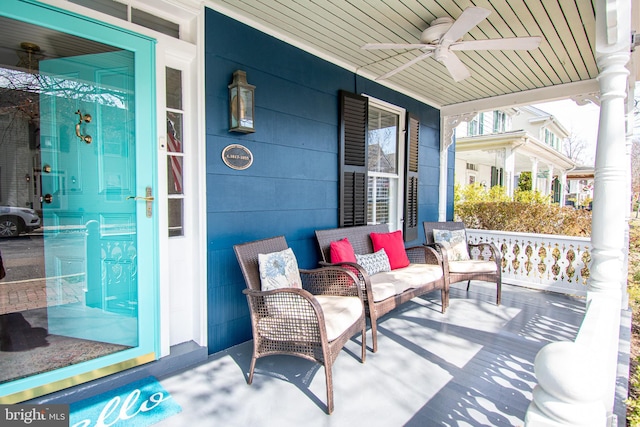 view of patio with a porch and ceiling fan