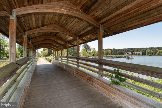 view of horse barn featuring a water view