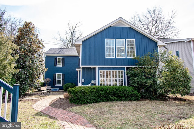 traditional-style house featuring a patio area