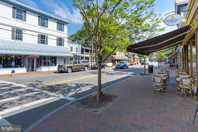 view of road featuring curbs and sidewalks