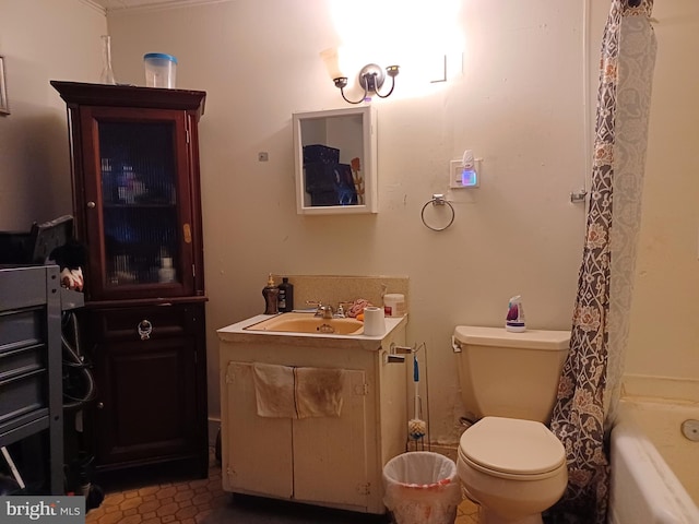 bathroom with toilet and vanity