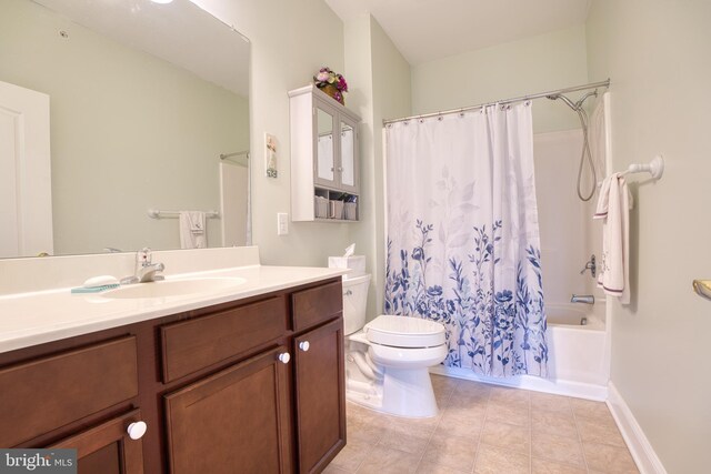 bathroom with toilet, shower / bath combo, vanity, tile patterned flooring, and baseboards
