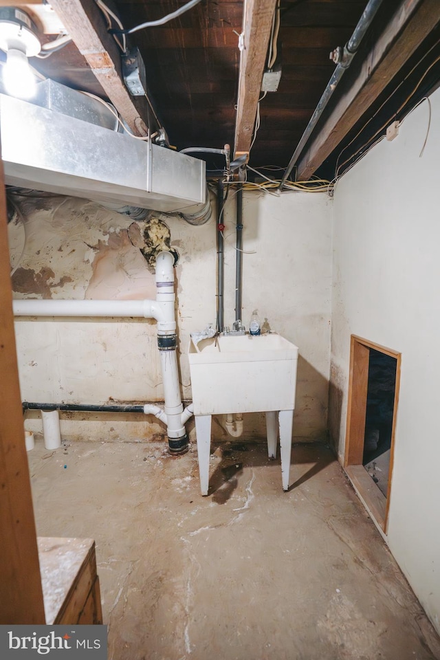 unfinished basement with a sink