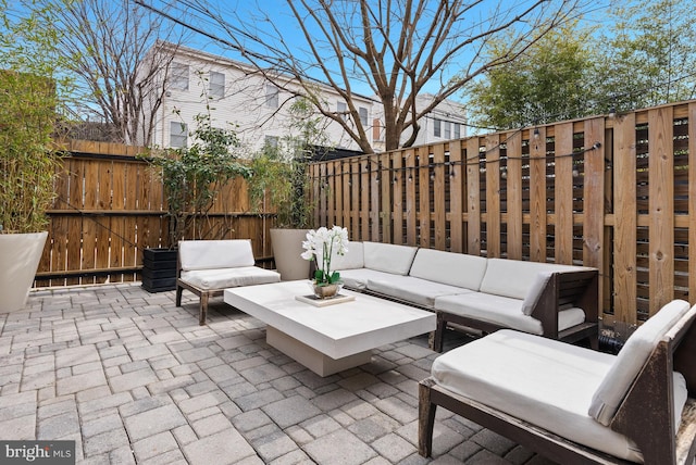 view of patio with fence private yard and an outdoor hangout area