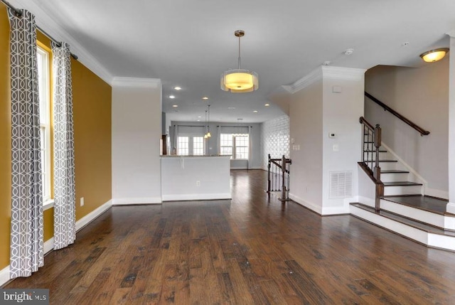 interior space with dark wood-style floors, recessed lighting, baseboards, and crown molding