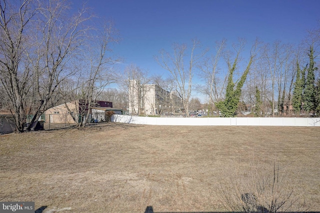 view of yard featuring fence