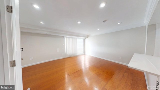 130 Saint Charles Sq Unit 130, Sterling, VA 20164 - unfurnished living room with light wood-style floors, crown molding, recessed lighting, and baseboards