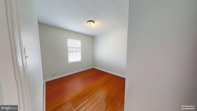 130 Saint Charles Sq Unit 130, Sterling, VA 20164 - empty room with baseboards and wood finished floors