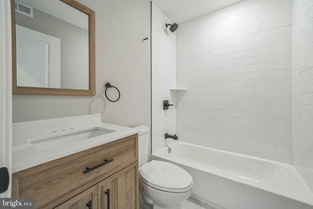 bathroom featuring visible vents, vanity, bathtub / shower combination, and toilet