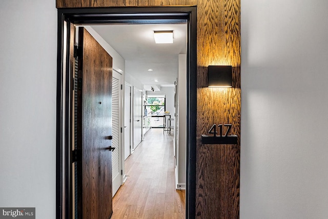 hall with light wood-style flooring