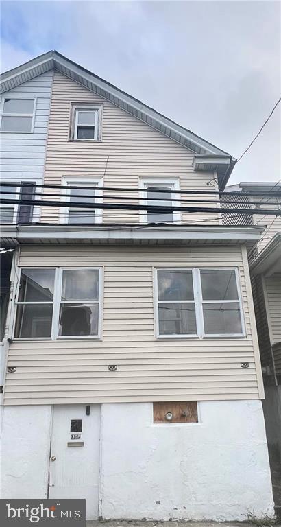 view of home's exterior featuring a balcony