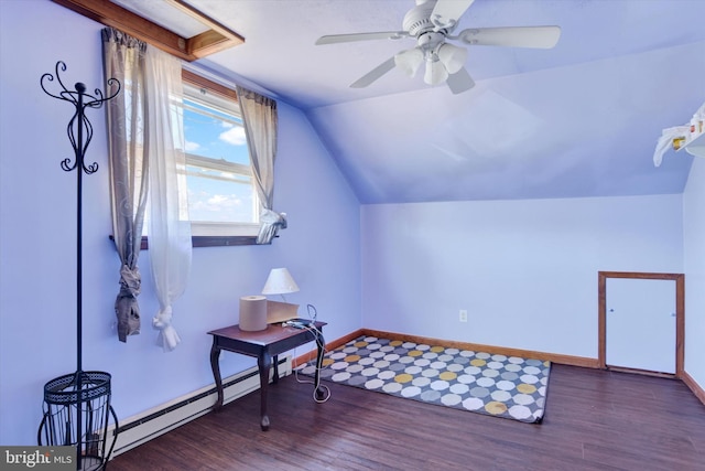 additional living space featuring vaulted ceiling, ceiling fan, wood finished floors, and baseboards