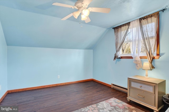 bonus room with a baseboard radiator, vaulted ceiling, baseboards, and wood finished floors