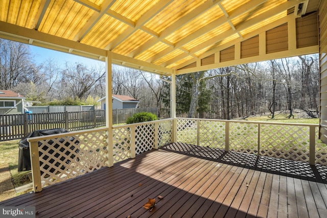 wooden deck featuring fence