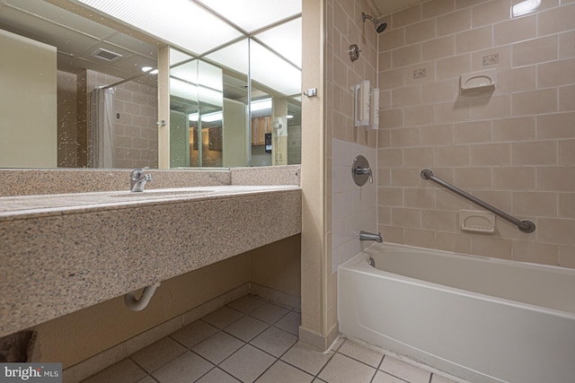 bathroom with tile patterned flooring, shower / bath combo, and visible vents