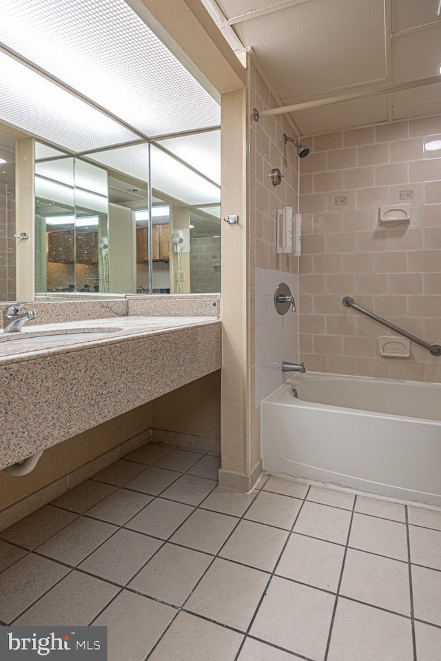 full bathroom featuring  shower combination, tile patterned flooring, and vanity