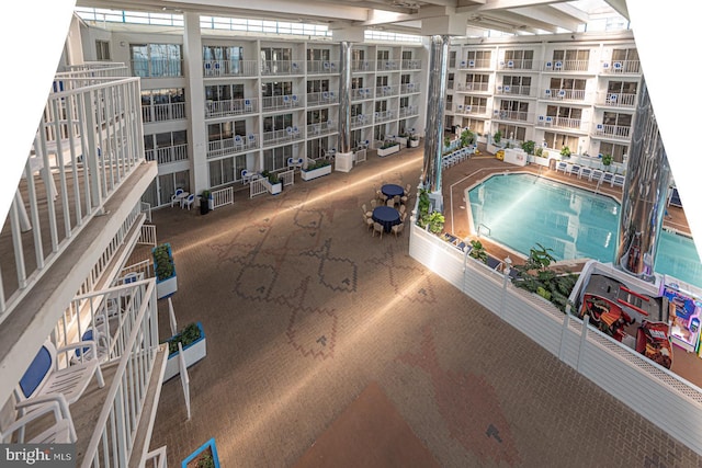 view of pool featuring a hot tub