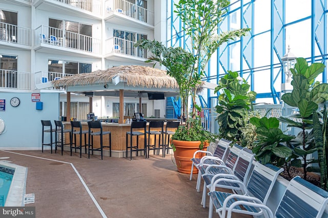 view of patio featuring outdoor dry bar