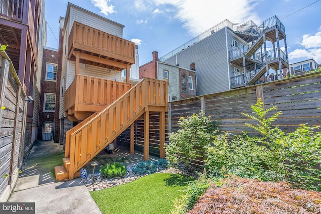 exterior space with stairway and fence