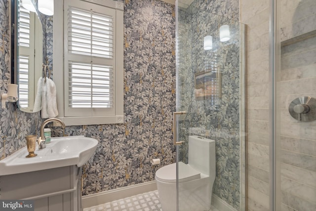 bathroom featuring a healthy amount of sunlight, wallpapered walls, a shower stall, and toilet