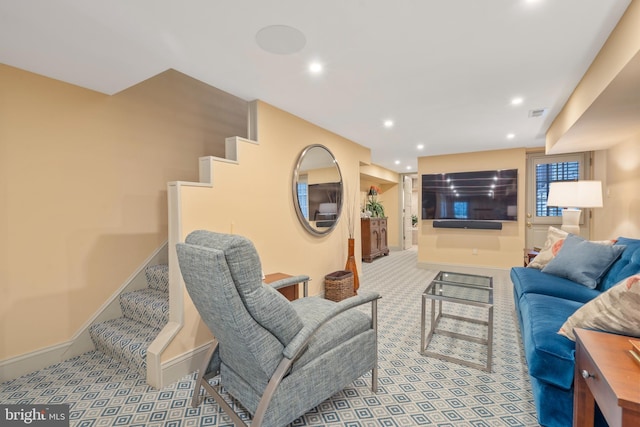 carpeted living room featuring stairs, visible vents, recessed lighting, and baseboards