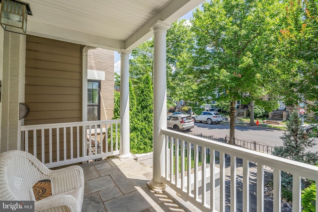 balcony featuring a porch