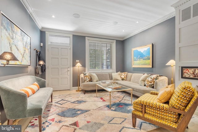 living area with crown molding