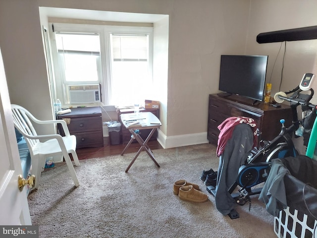 home office with carpet floors, cooling unit, and baseboards