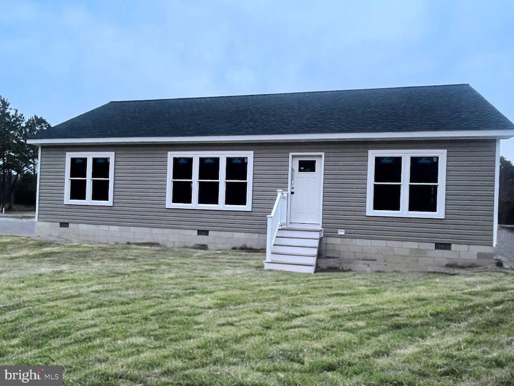 view of front of home featuring entry steps, roof with shingles, and crawl space