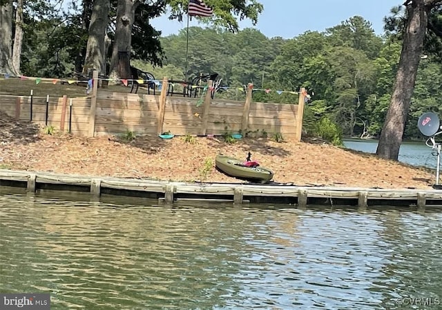 view of dock with a water view